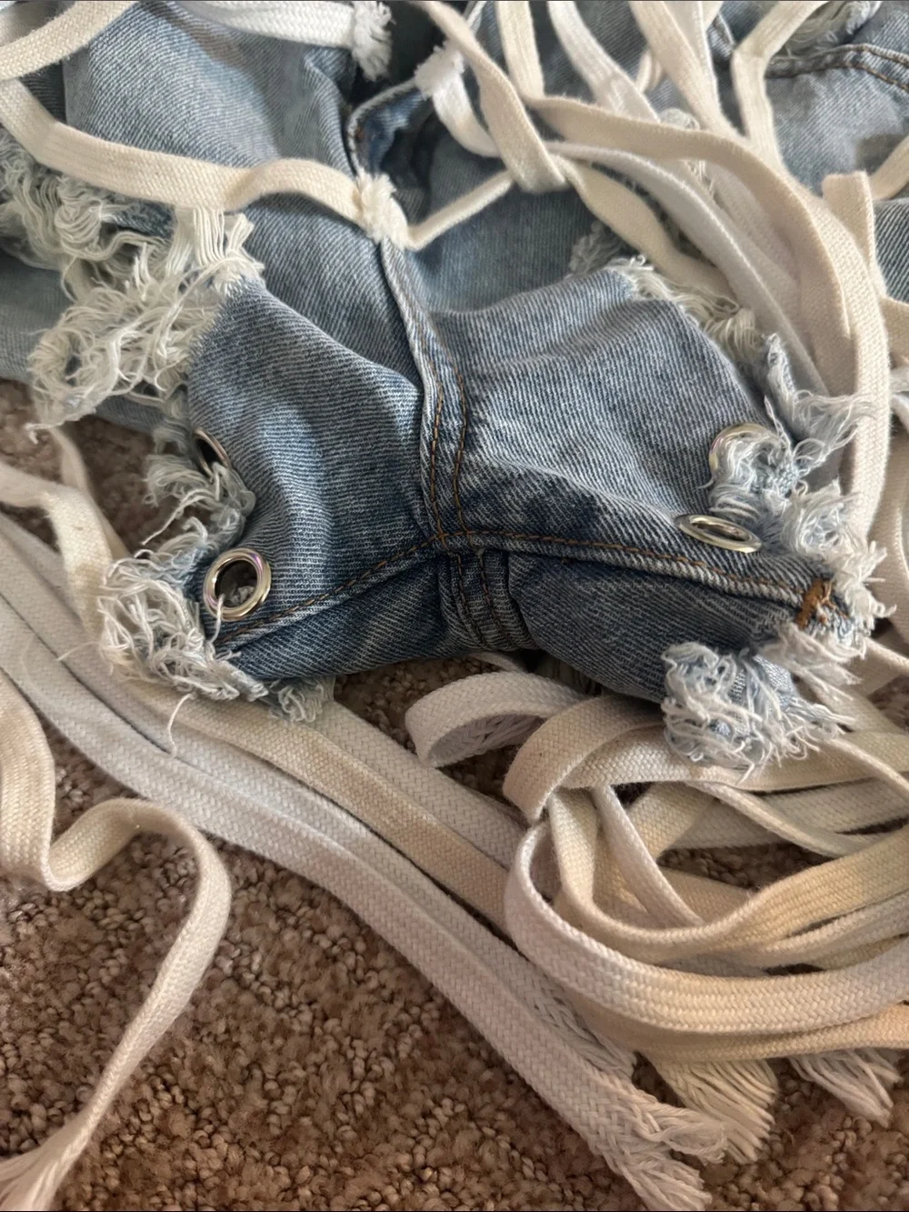 Distressed Light Blue Denim Shoe Lace Grommet Fringe Shorts